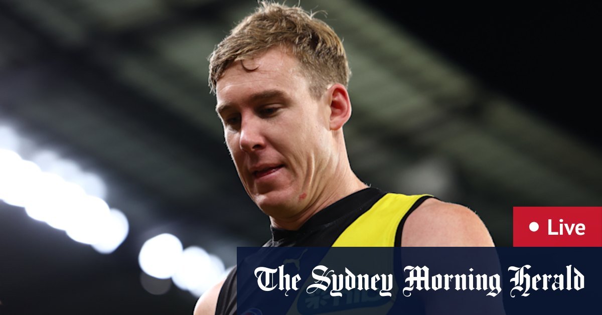 Tiger's hand-hand-hand-hand-hand-hand-handling hand-handle after the fist on Adelaide Crows Jordon Butts
